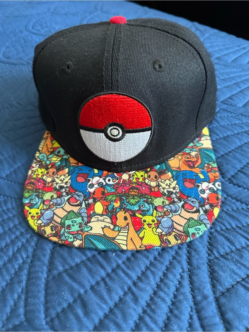 Kids Black Snapback Hat with Red & Multicolor Poké Print Visor